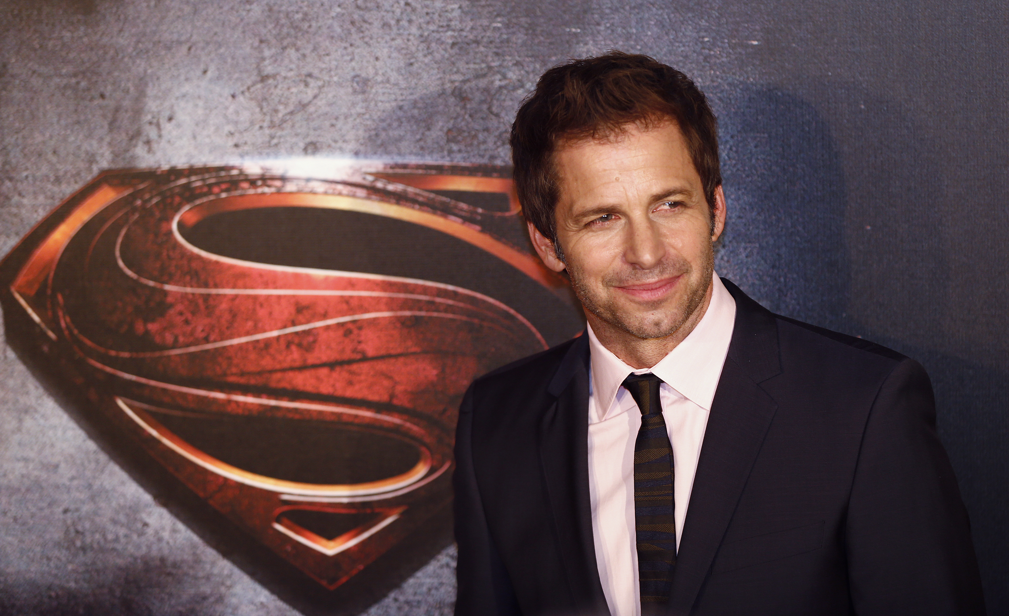 Director Zack Snyder poses for pictures after his arrival to the Australian premiere of "Man of Steel" in central Sydney June 24, 2013. REUTERS/Daniel Munoz (AUSTRALIA - Tags: ENTERTAINMENT) - RTX10YW0